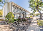 Thumbnail 9 of 35 - Gravel area in front of the house at Pinewood Townhomes, Tucker