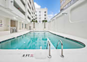 Thumbnail 5 of 47 - A small indoor pool with a height restriction of 8 feet.