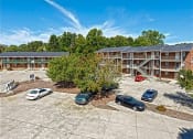Thumbnail 14 of 27 - an aerial view of an apartment building and parking lot