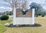 Thumbnail 25 of 25 - A sign that says "Osprey Cove" with a bird silhouette on it.