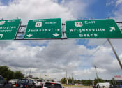 Thumbnail 27 of 30 - a highway sign that reads west williamsburg, north jacksonville and wrightsville