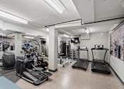 Thumbnail 17 of 50 - the gym is equipped with cardio equipment and weights