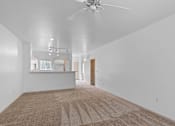Thumbnail 20 of 29 - a living room with white walls and a ceiling fan at Oriel Apartments, Portland, Oregon