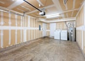 Thumbnail 49 of 50 - a large room with white walls and appliances in it at Summer Creek Apartments, Tigard, OR, 97223