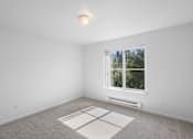 Thumbnail 15 of 50 - a white room with a window and carpet at Summer Creek Apartments, Tigard, OR