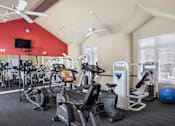 Thumbnail 8 of 50 - a gym with cardio equipment at Summer Creek Apartments, Tigard, OR