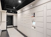Thumbnail 47 of 47 - a storage room with white cabinets and a black ceiling