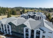 Thumbnail 27 of 27 - a view from above of a city with roofs and trees at Sonder Fields in Happy Valley, OR