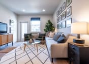 Thumbnail 4 of 27 - a living room with a couch and a tv at Sonder Fields in Happy Valley, OR