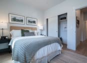Thumbnail 5 of 27 - a bedroom with a bed and a closet at Sonder Fields in Happy Valley, OR