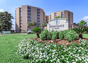 Thumbnail 1 of 17 - A sign that says Renaissance Place in front of a building.