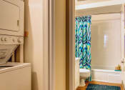 Thumbnail 18 of 38 - Laundry and Bathroom at Madison Rockwood, Ballwin, MO, 63011