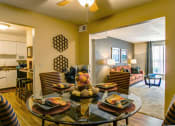 Thumbnail 13 of 38 - Dining room looking into living room and kitchen at Madison Rockwood, Ballwin, MO, 63011