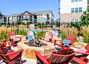 Thumbnail 21 of 26 - firepit seating at Bucking Horse Apartments, Fort Collins, 80525
