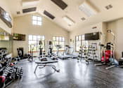 Thumbnail 16 of 26 - Fitness center including suspension resistence at Bucking Horse Apartments, Fort Collins, CO