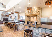 Thumbnail 12 of 26 - Demonstration Kitchen in Clubhouse at Bucking Horse Apartments, Fort Collins
