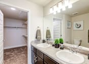 Thumbnail 7 of 26 - primary bathroom in model apartment at Bucking Horse Apartments, Fort Collins, 80525
