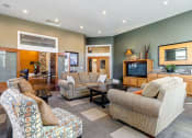 Thumbnail 22 of 30 - a living room with couches and a tv at Madison Sierra Sun, Puyallup, Washington