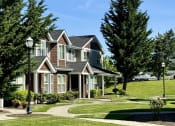 Thumbnail 5 of 30 - a house with a sidewalk in front of it at Madison Sierra Sun, Puyallup, WA, 98374