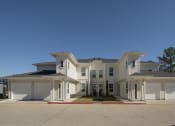 Thumbnail 29 of 33 - Townhome building with garages at The Parkway on Westlake, Humble, Texas