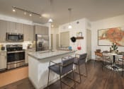 Thumbnail 10 of 33 - Kitchen and Dining at The Parkway on Westlake, Humble, Texas