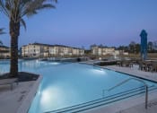 Thumbnail 5 of 33 - Pool in evening  at The Parkway on Westlake, Texas, 77346