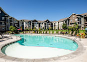 Thumbnail 2 of 26 - Pool with shelf at Bucking Horse Apartments, Fort Collins