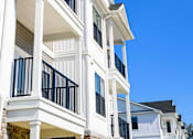 Thumbnail 114 of 124 - A white building with balconies and railings at Madison Prickett Preserve, Yardley Pennsylvania