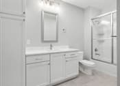 Thumbnail 97 of 124 - A white bathroom with a toilet, sink, and mirror at Madison Prickett Preserve, Pennsylvania, 19067