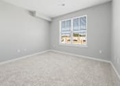 Thumbnail 94 of 124 - A room with a carpeted floor and a window with blinds at Madison Prickett Preserve, Yardley