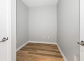 Thumbnail 105 of 124 - A room with a white door and a wooden floor at Madison Prickett Preserve, Yardley, 19067