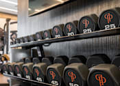Thumbnail 26 of 124 - a rack of dumbbells in the gym at Madison Prickett Preserve, Yardley, PA