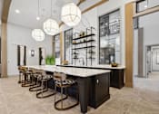 Thumbnail 3 of 124 - a large kitchen with a marble counter top and bar stools at Madison Prickett Preserve, Yardley, PA
