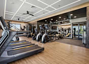 Thumbnail 23 of 124 - A gym with treadmills, elliptical machines, and other exercise equipment at Madison Prickett Preserve, Yardley Pennsylvania