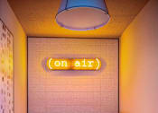 Thumbnail 34 of 124 - a conference room with a table and chairs and a neon sign on the wall at Madison Prickett Preserve, Yardley, 19067
