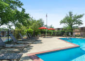 Thumbnail 3 of 38 - Pool and lounge chairs at Madison Rockwood, Ballwin, MO, 63011