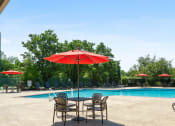 Thumbnail 4 of 38 - Table and Chair seating at Pool at Madison Rockwood, Ballwin, Missouri