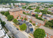 Thumbnail 1 of 17 - an aerial view of an apartment complex and parking lot