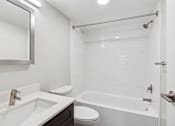 Thumbnail 12 of 15 - Bright tub shower combo at Park Montgomery apartments located along the Purple Line in Silver Spring, MD.