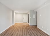 Thumbnail 3 of 15 - Open concept living and dining at Park Montgomery apartments located along the Purple Line in Silver Spring, MD.