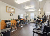 Thumbnail 7 of 17 - a room with a lot of chairs and a clock on the wall