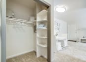 Thumbnail 7 of 19 - Spacious bedroom closet at Meadowbrook Run Apartments in Congress Heights, D.C., offering ample storage space with built-in shelving—ideal for organizing clothing, shoes, and personal belongings in our thoughtfully designed apartment homes.