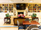 Thumbnail 2 of 14 - Spacious community room at Park View at Colonial Landing where senior residents gather for coffee, activities, and social events in a friendly, supportive environment.