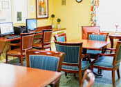 Thumbnail 13 of 14 - Spacious community roomSpacious community room at Park View at Colonial Landing where senior residents gather for coffee, activities, and social events in a friendly, supportive environment.