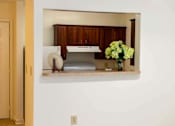 Thumbnail 11 of 14 - Modern, fully equipped kitchen with safety features in a senior apartment at Park View at Colonial Landing, a 62+ active adult community in Elkridge, MD.