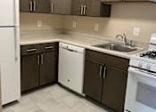 Thumbnail 6 of 14 - A kitchen at Randle Hill affordable apartment community located in Washington, DC