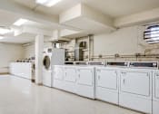 Thumbnail 10 of 19 - Clean and convenient on-site laundry facilities at Meadowbrook Run Apartments, offering washers and dryers for residents.