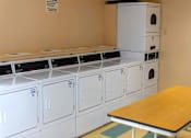Thumbnail 6 of 9 - On-site laundry room offering added convenience for residents of College Parkway Place, an Enterprise community providing quality housing and supportive services.