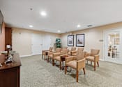 Thumbnail 9 of 18 - a room with a row of chairs in front of a tv