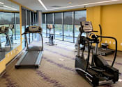 Thumbnail 26 of 30 - Fitness center at Metro Heights apartment community in Baltimore.